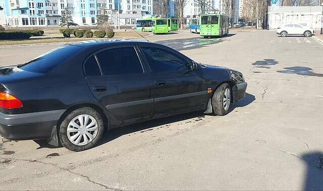 Черный Тойота Авенсис, объемом двигателя 2 л и пробегом 400 тыс. км за 3500 $, фото 19 на Automoto.ua
