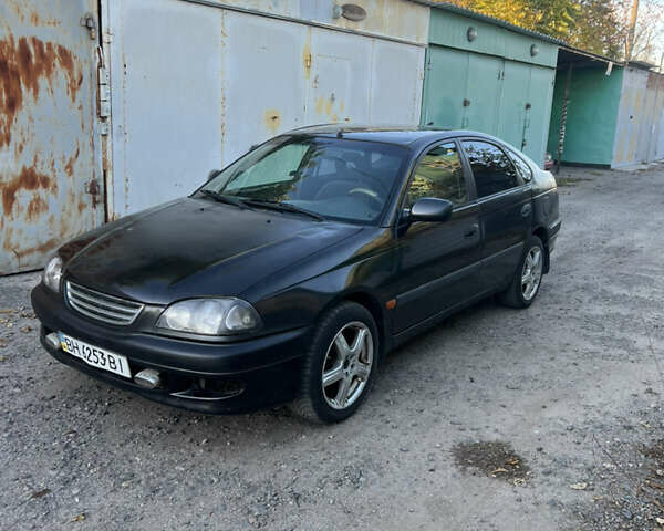 Чорний Тойота Авенсіс, об'ємом двигуна 1.59 л та пробігом 256 тис. км за 2450 $, фото 1 на Automoto.ua