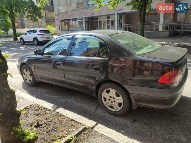 Черный Тойота Авенсис, объемом двигателя 2 л и пробегом 290 тыс. км за 3400 $, фото 5 на Automoto.ua