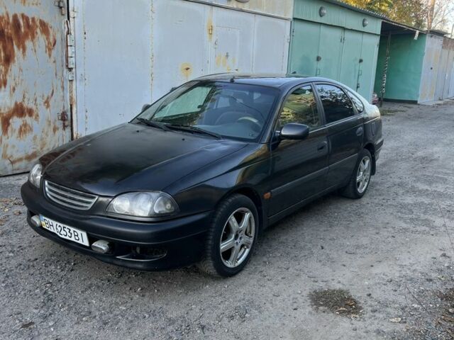 Чорний Тойота Авенсіс, об'ємом двигуна 1.6 л та пробігом 256 тис. км за 2450 $, фото 1 на Automoto.ua