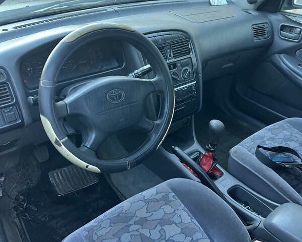 Чорний Тойота Авенсіс, об'ємом двигуна 1.59 л та пробігом 256 тис. км за 2450 $, фото 5 на Automoto.ua