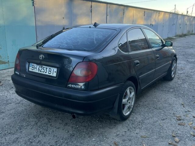 Чорний Тойота Авенсіс, об'ємом двигуна 1.6 л та пробігом 256 тис. км за 2450 $, фото 4 на Automoto.ua