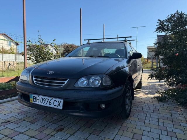 Черный Тойота Авенсис, объемом двигателя 1.8 л и пробегом 400 тыс. км за 2599 $, фото 1 на Automoto.ua