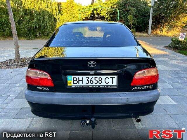 Черный Тойота Авенсис, объемом двигателя 2 л и пробегом 255 тыс. км за 3150 $, фото 4 на Automoto.ua