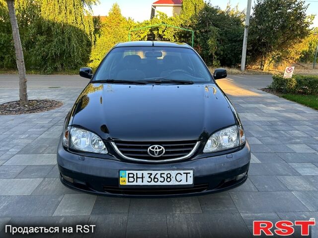 Черный Тойота Авенсис, объемом двигателя 2 л и пробегом 255 тыс. км за 3150 $, фото 1 на Automoto.ua