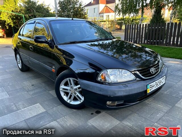 Черный Тойота Авенсис, объемом двигателя 2 л и пробегом 255 тыс. км за 3150 $, фото 3 на Automoto.ua