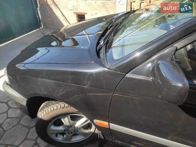 Черный Тойота Авенсис, объемом двигателя 2 л и пробегом 375 тыс. км за 3479 $, фото 9 на Automoto.ua