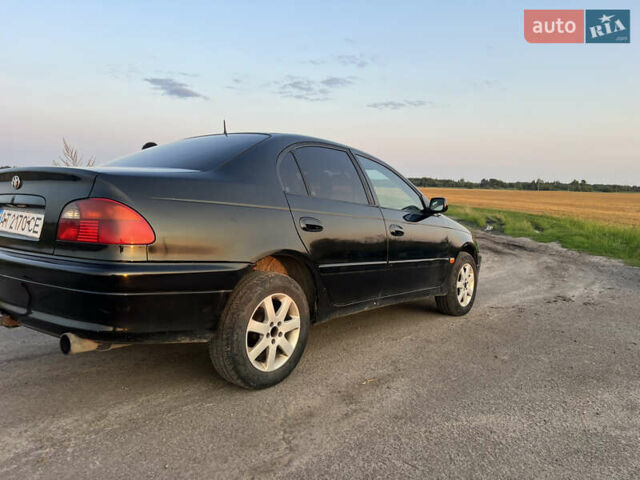 Черный Тойота Авенсис, объемом двигателя 1.99 л и пробегом 252 тыс. км за 3300 $, фото 2 на Automoto.ua