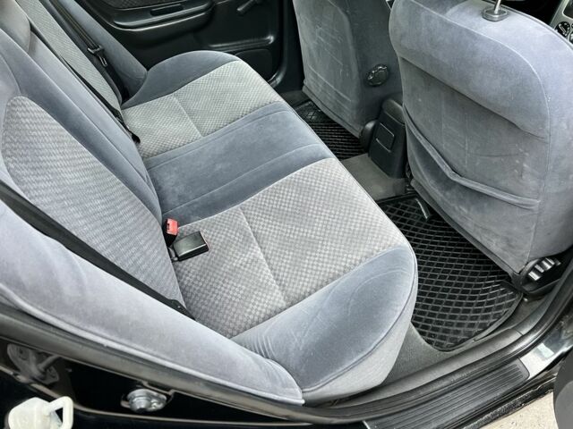 Черный Тойота Авенсис, объемом двигателя 1.6 л и пробегом 435 тыс. км за 3500 $, фото 7 на Automoto.ua