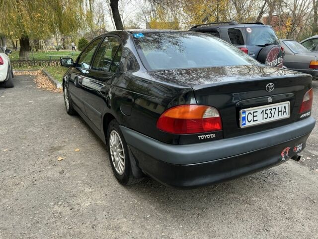 Черный Тойота Авенсис, объемом двигателя 1.6 л и пробегом 435 тыс. км за 3500 $, фото 5 на Automoto.ua