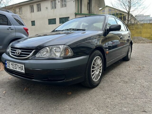 Черный Тойота Авенсис, объемом двигателя 1.6 л и пробегом 435 тыс. км за 3500 $, фото 1 на Automoto.ua