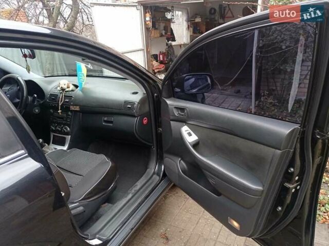 Чорний Тойота Авенсіс, об'ємом двигуна 1.8 л та пробігом 180 тис. км за 7500 $, фото 12 на Automoto.ua