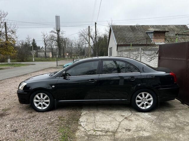 Черный Тойота Авенсис, объемом двигателя 2 л и пробегом 300 тыс. км за 4200 $, фото 1 на Automoto.ua