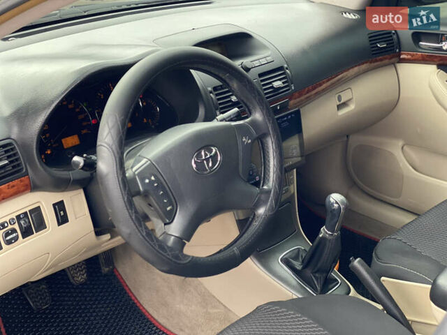 Черный Тойота Авенсис, объемом двигателя 2 л и пробегом 400 тыс. км за 5899 $, фото 7 на Automoto.ua