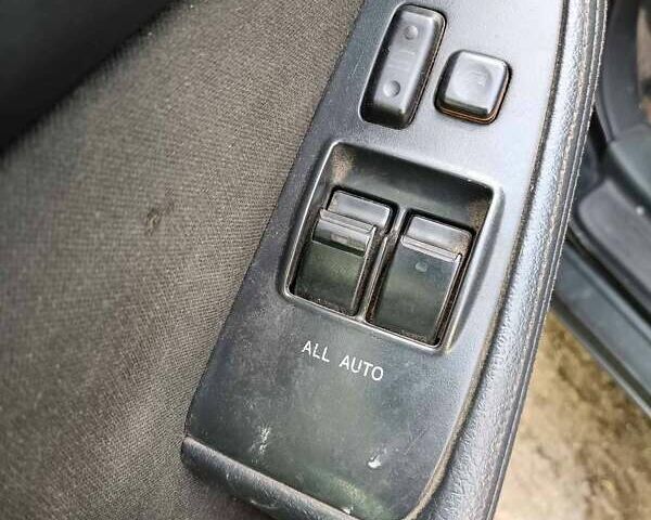 Черный Тойота Авенсис, объемом двигателя 1.79 л и пробегом 181 тыс. км за 4500 $, фото 7 на Automoto.ua