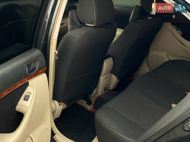 Черный Тойота Авенсис, объемом двигателя 2 л и пробегом 400 тыс. км за 5899 $, фото 9 на Automoto.ua