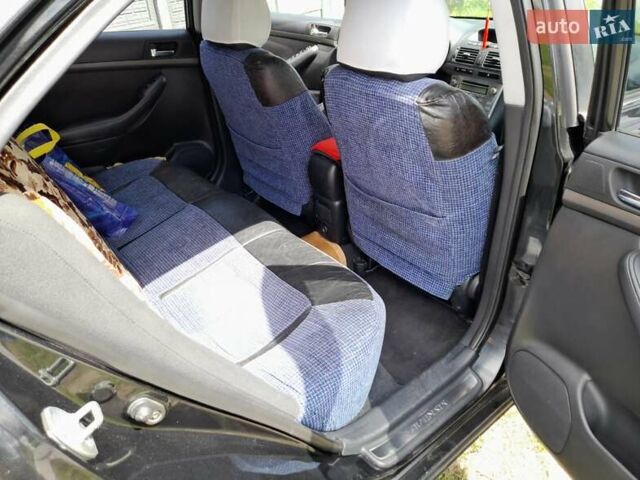 Черный Тойота Авенсис, объемом двигателя 1.8 л и пробегом 310 тыс. км за 6800 $, фото 7 на Automoto.ua