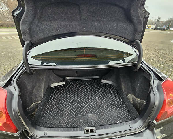 Чорний Тойота Авенсіс, об'ємом двигуна 2 л та пробігом 264 тис. км за 4450 $, фото 4 на Automoto.ua