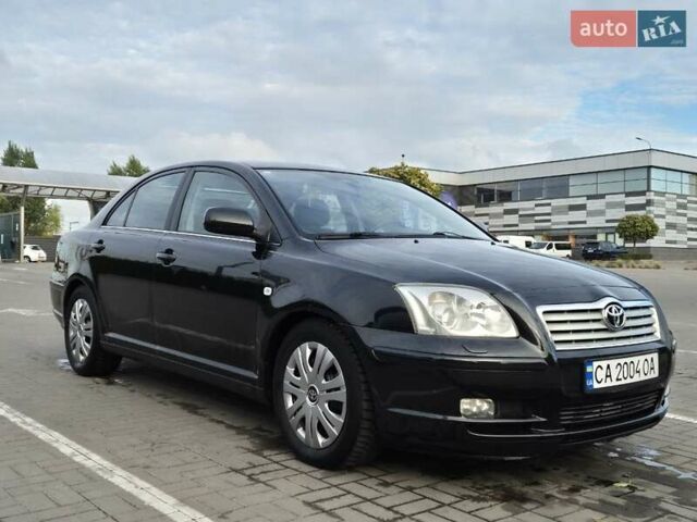 Черный Тойота Авенсис, объемом двигателя 2.36 л и пробегом 225 тыс. км за 5850 $, фото 1 на Automoto.ua
