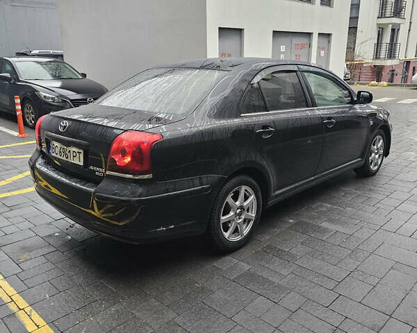 Чорний Тойота Авенсіс, об'ємом двигуна 2 л та пробігом 264 тис. км за 4500 $, фото 3 на Automoto.ua