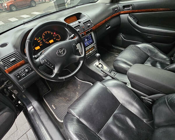 Чорний Тойота Авенсіс, об'ємом двигуна 2 л та пробігом 264 тис. км за 4500 $, фото 4 на Automoto.ua