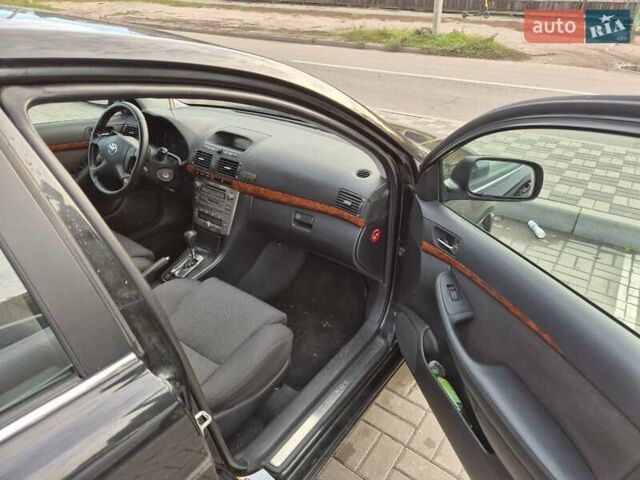 Черный Тойота Авенсис, объемом двигателя 2.36 л и пробегом 225 тыс. км за 5850 $, фото 5 на Automoto.ua