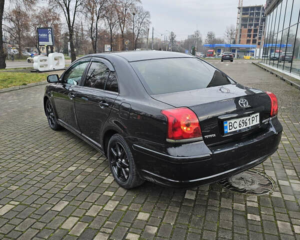 Чорний Тойота Авенсіс, об'ємом двигуна 2 л та пробігом 264 тис. км за 4450 $, фото 3 на Automoto.ua