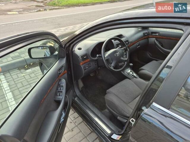Черный Тойота Авенсис, объемом двигателя 2.36 л и пробегом 225 тыс. км за 5850 $, фото 4 на Automoto.ua