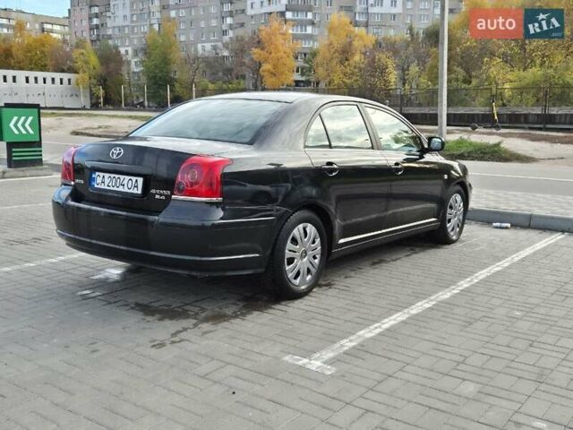 Черный Тойота Авенсис, объемом двигателя 2.36 л и пробегом 225 тыс. км за 5850 $, фото 2 на Automoto.ua