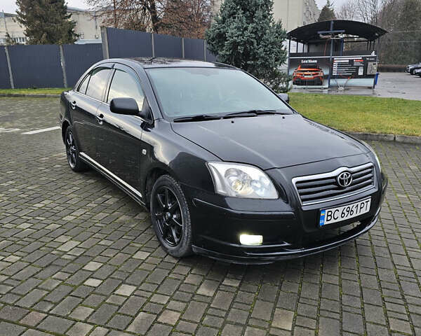 Чорний Тойота Авенсіс, об'ємом двигуна 2 л та пробігом 264 тис. км за 4450 $, фото 1 на Automoto.ua