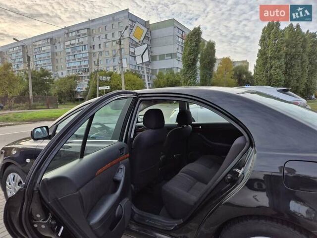 Черный Тойота Авенсис, объемом двигателя 2.36 л и пробегом 225 тыс. км за 5850 $, фото 7 на Automoto.ua