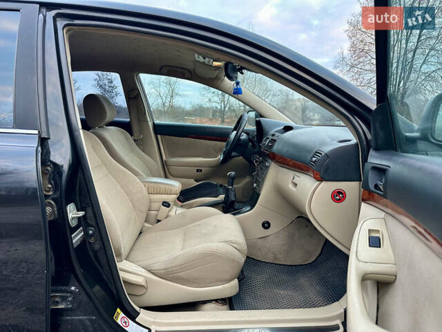 Черный Тойота Авенсис, объемом двигателя 1.79 л и пробегом 335 тыс. км за 4450 $, фото 9 на Automoto.ua