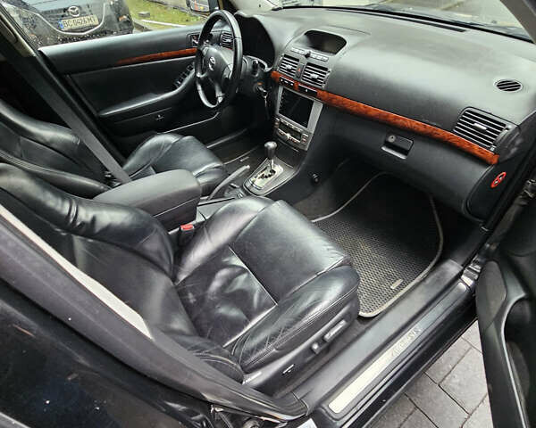 Чорний Тойота Авенсіс, об'ємом двигуна 2 л та пробігом 264 тис. км за 4500 $, фото 6 на Automoto.ua