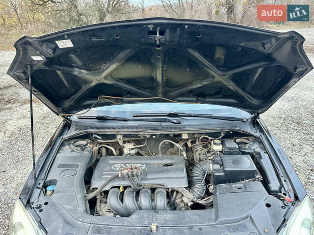 Черный Тойота Авенсис, объемом двигателя 1.79 л и пробегом 335 тыс. км за 4450 $, фото 18 на Automoto.ua