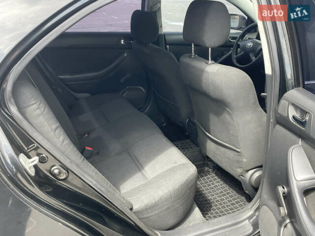 Черный Тойота Авенсис, объемом двигателя 1.8 л и пробегом 451 тыс. км за 4900 $, фото 4 на Automoto.ua
