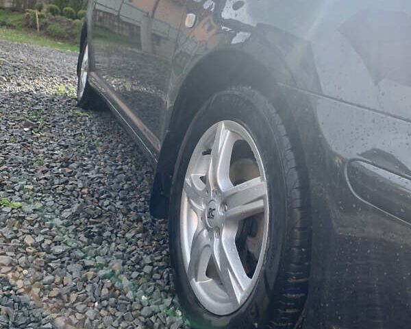 Черный Тойота Авенсис, объемом двигателя 1.8 л и пробегом 199 тыс. км за 6999 $, фото 5 на Automoto.ua