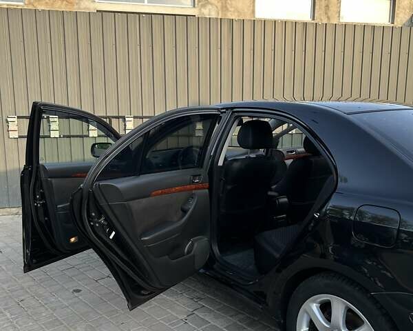 Черный Тойота Авенсис, объемом двигателя 1.79 л и пробегом 183 тыс. км за 6200 $, фото 13 на Automoto.ua