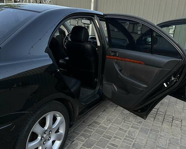 Черный Тойота Авенсис, объемом двигателя 1.79 л и пробегом 183 тыс. км за 6200 $, фото 8 на Automoto.ua