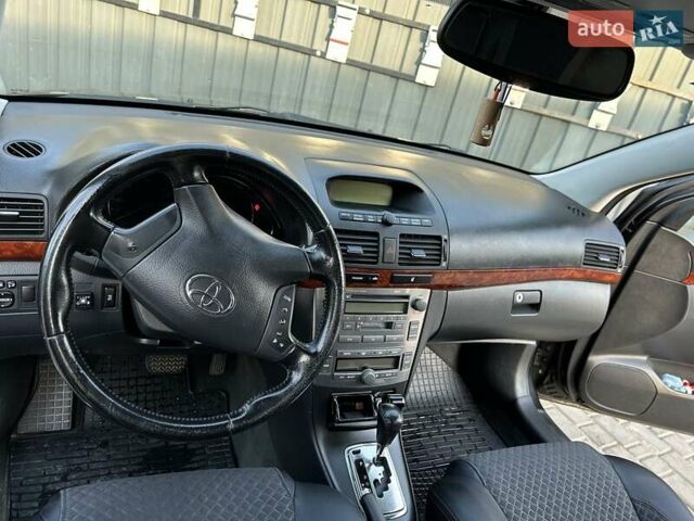 Черный Тойота Авенсис, объемом двигателя 1.79 л и пробегом 183 тыс. км за 6200 $, фото 5 на Automoto.ua
