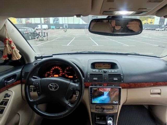 Черный Тойота Авенсис, объемом двигателя 2 л и пробегом 240 тыс. км за 5500 $, фото 1 на Automoto.ua