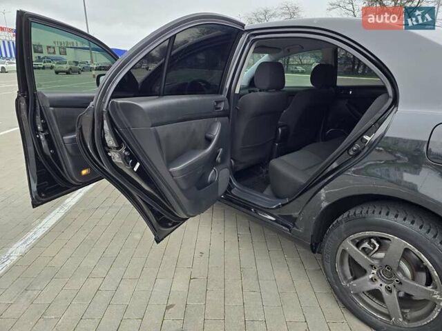 Черный Тойота Авенсис, объемом двигателя 2 л и пробегом 350 тыс. км за 4999 $, фото 28 на Automoto.ua