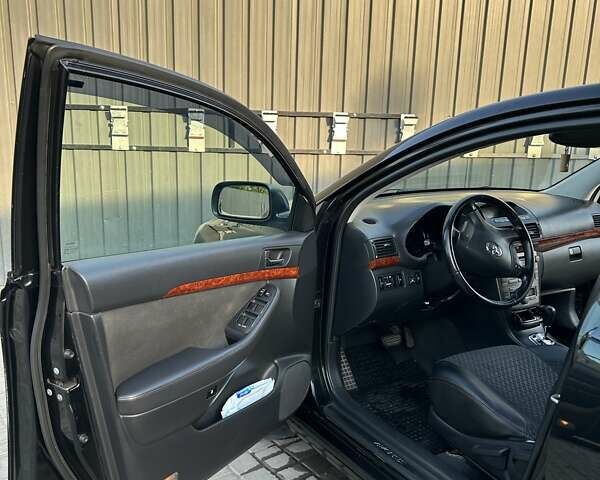 Черный Тойота Авенсис, объемом двигателя 1.79 л и пробегом 183 тыс. км за 6200 $, фото 14 на Automoto.ua