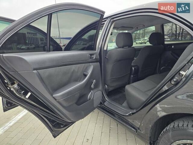 Черный Тойота Авенсис, объемом двигателя 2 л и пробегом 350 тыс. км за 4999 $, фото 27 на Automoto.ua