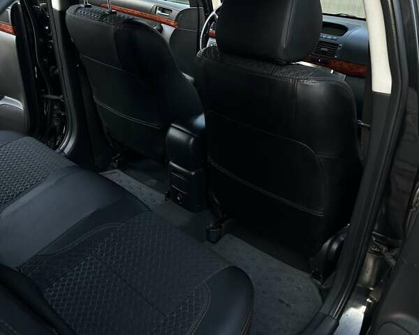 Черный Тойота Авенсис, объемом двигателя 1.79 л и пробегом 183 тыс. км за 6200 $, фото 9 на Automoto.ua