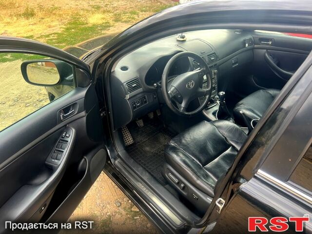 Чорний Тойота Авенсіс, об'ємом двигуна 2 л та пробігом 300 тис. км за 6400 $, фото 4 на Automoto.ua