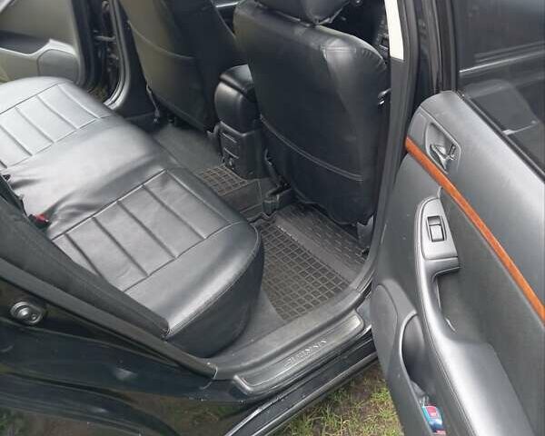 Черный Тойота Авенсис, объемом двигателя 1.79 л и пробегом 218 тыс. км за 7200 $, фото 9 на Automoto.ua