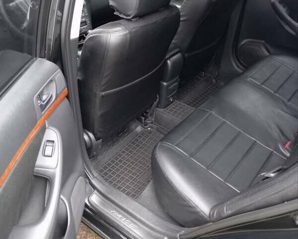 Черный Тойота Авенсис, объемом двигателя 1.79 л и пробегом 218 тыс. км за 7200 $, фото 3 на Automoto.ua