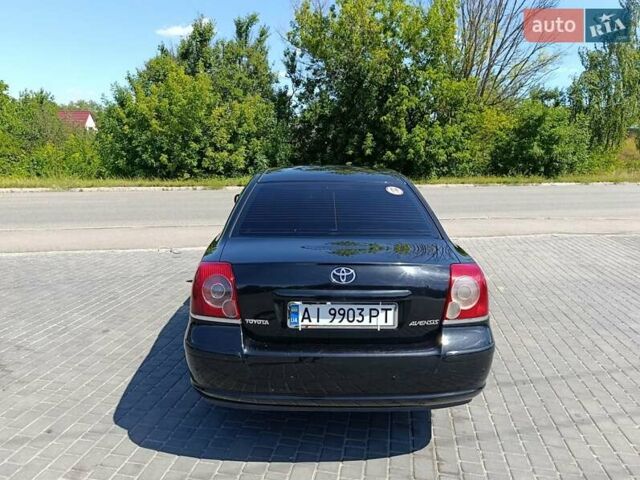 Черный Тойота Авенсис, объемом двигателя 2 л и пробегом 220 тыс. км за 6500 $, фото 1 на Automoto.ua