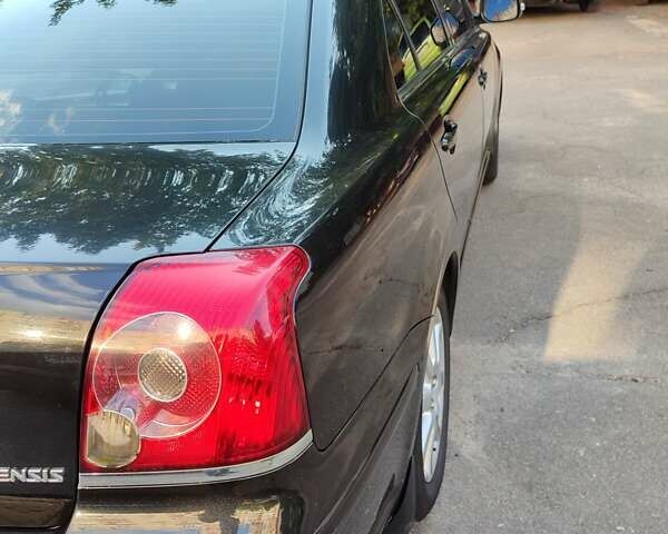 Черный Тойота Авенсис, объемом двигателя 1.8 л и пробегом 320 тыс. км за 7200 $, фото 69 на Automoto.ua
