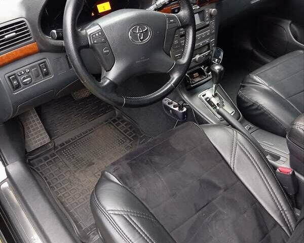 Черный Тойота Авенсис, объемом двигателя 1.79 л и пробегом 218 тыс. км за 7200 $, фото 15 на Automoto.ua